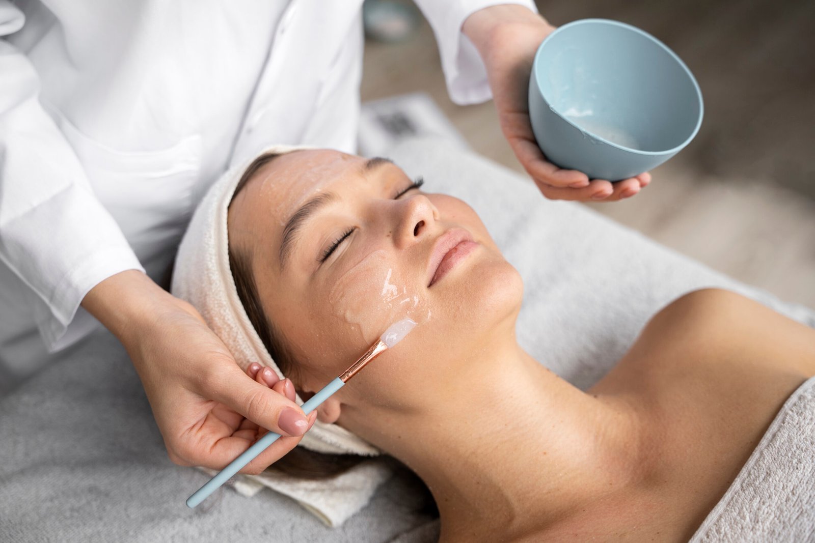 high-angle-woman-getting-massaged-spa-2